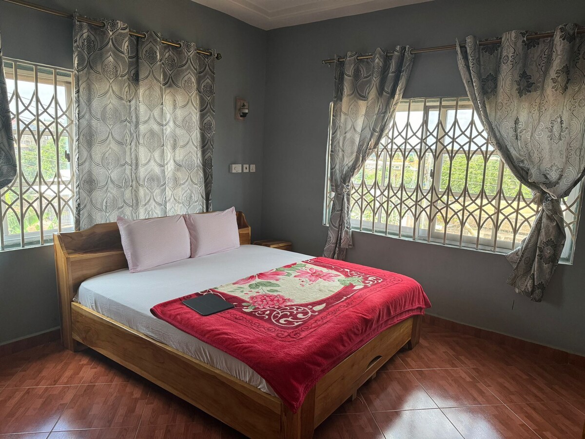 Refined guest room interior with workspace